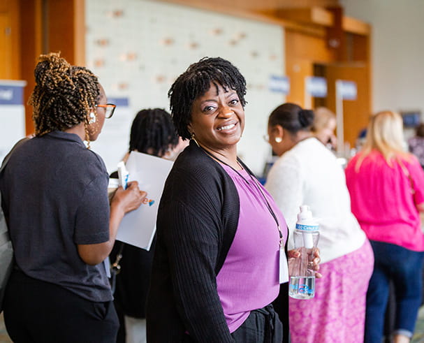 Pri-Med attendee enjoying herself at the conference