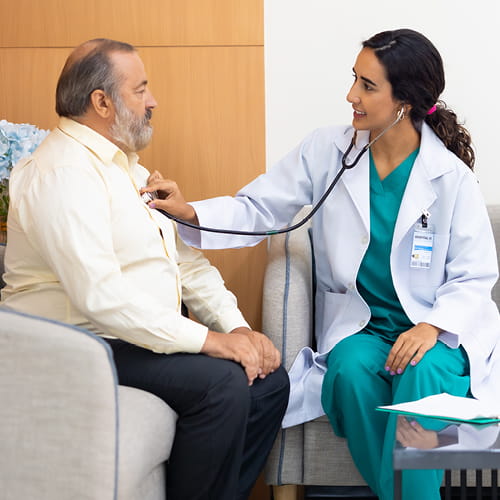 Doctor listening to a patient's heart