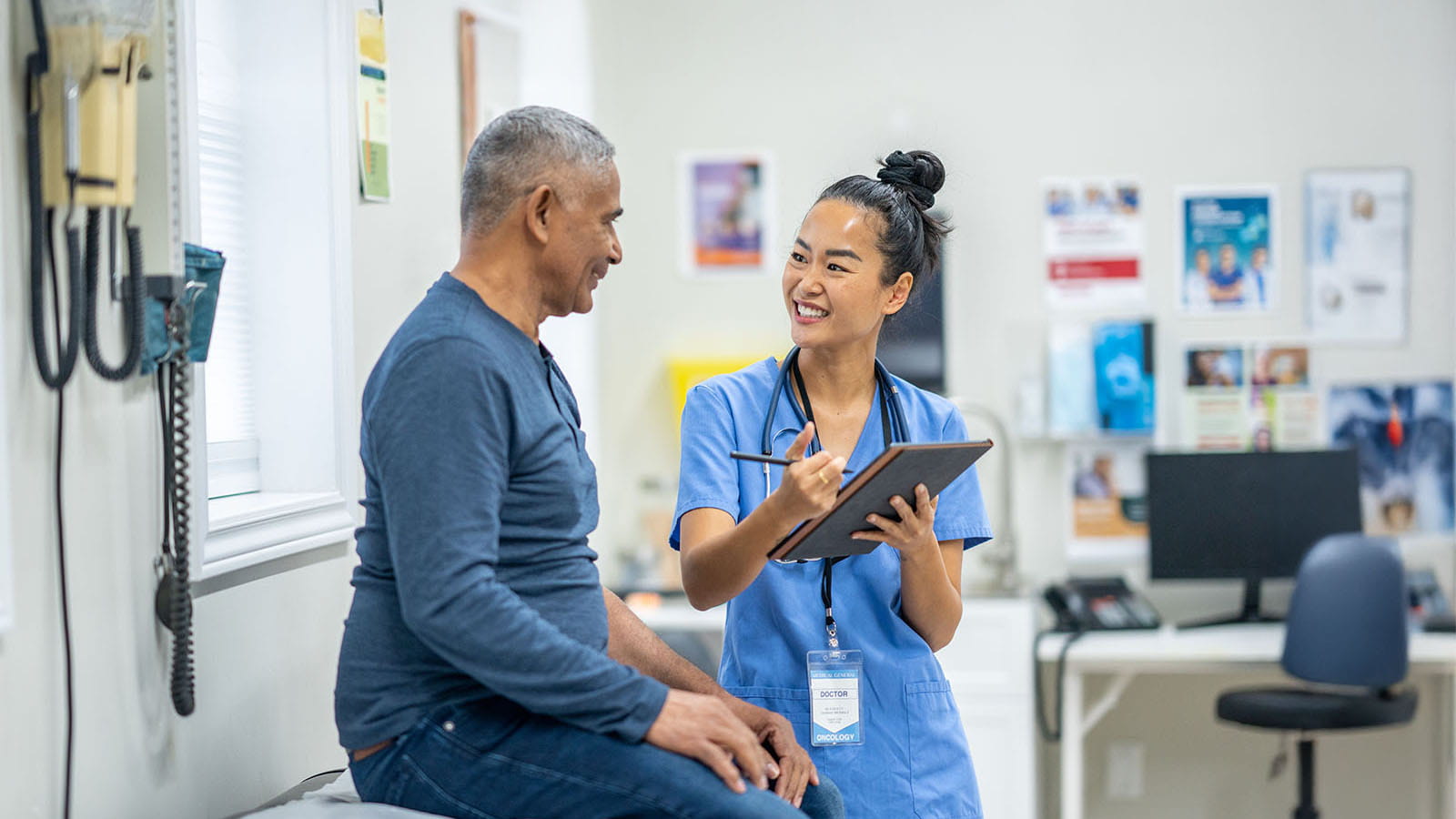 nurse talking to patient