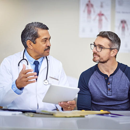 doctor talking with patient