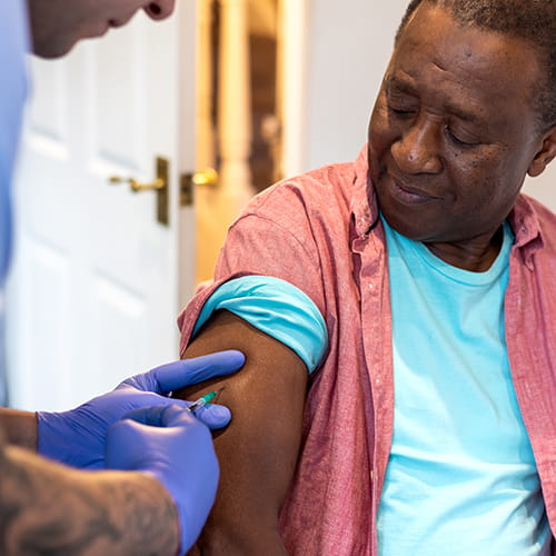 man getting a vaccine