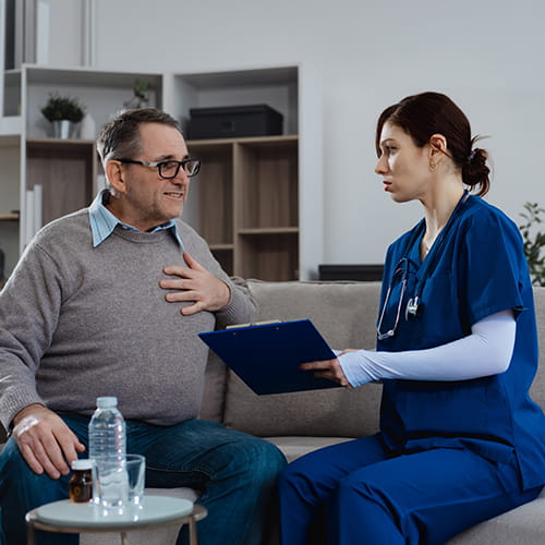 nurse talking to patient