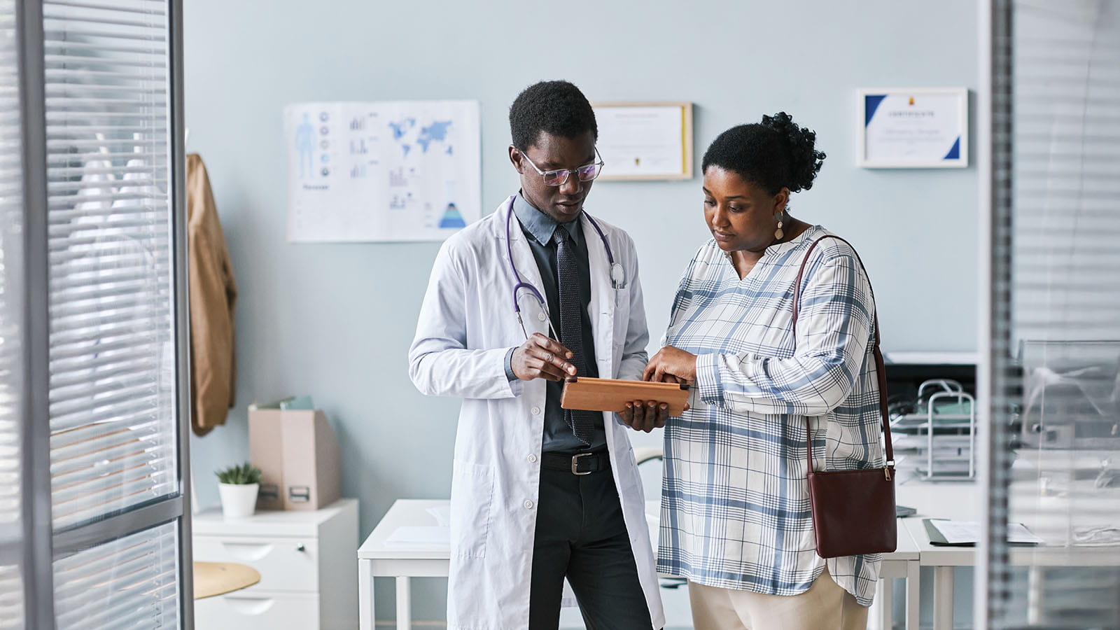 doctor conversing with patient